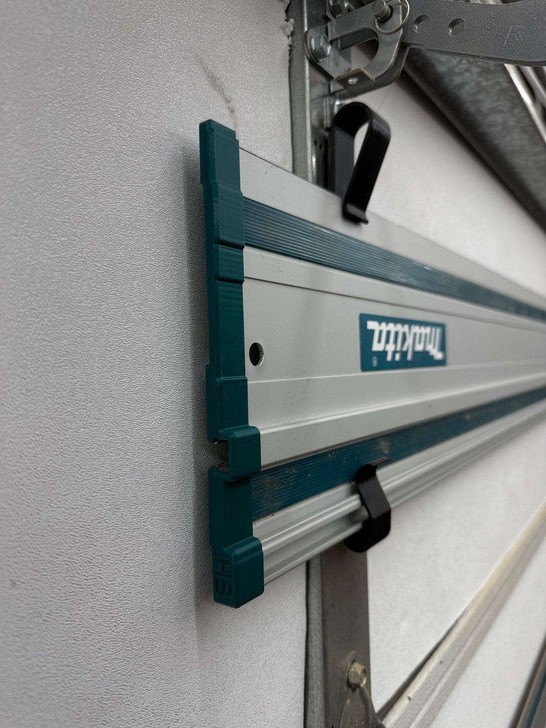 Slim Huntington Builds track saw guide rail end cap installed on a Makita guide rail